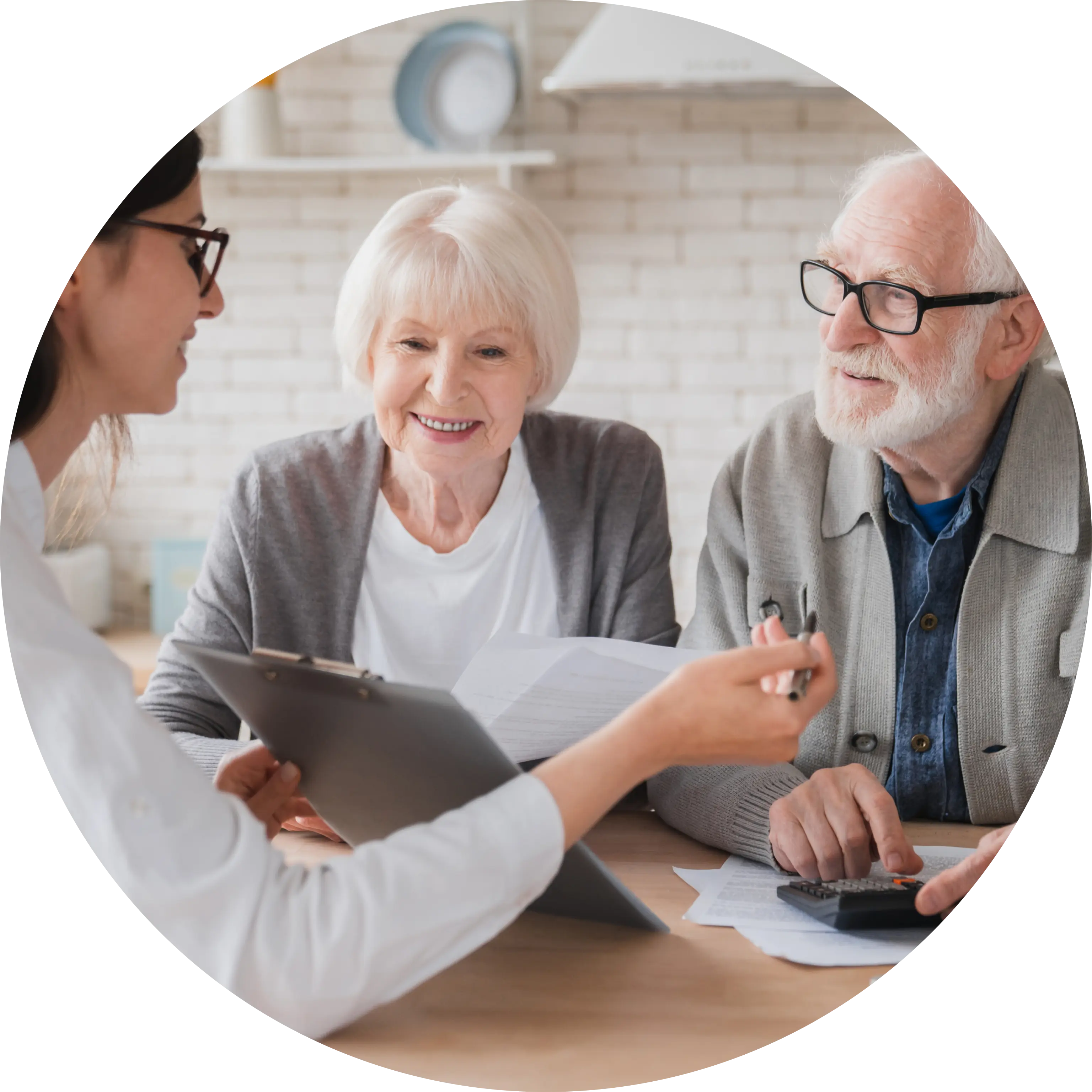 Elderly couple consulting with a professional.